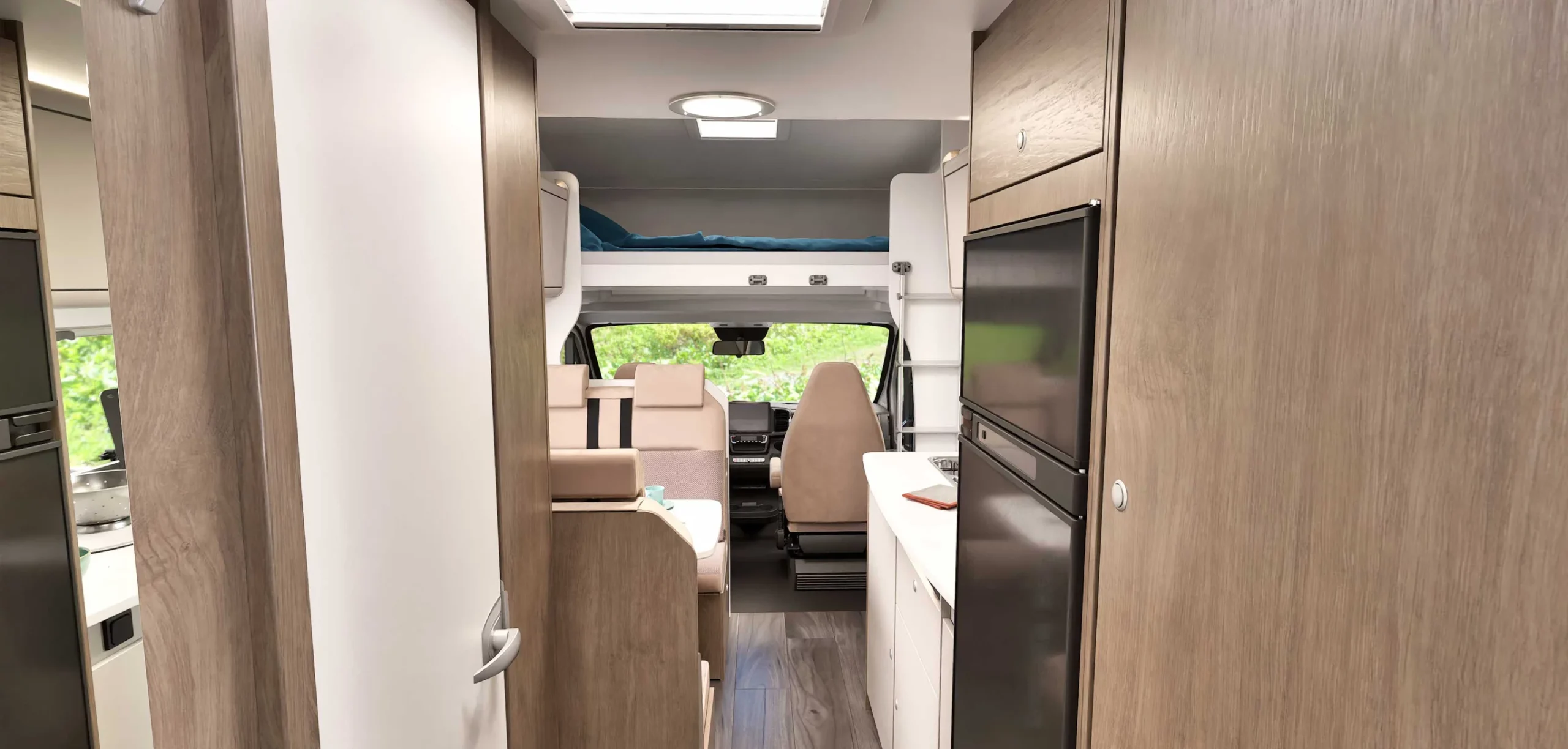 carado_wohmobil_kaufen_alkoven_impressionen_alkovenbett_1@2x